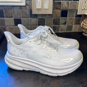 Hokas size 6.5 women’s. White and yellow with speckle soles. Great shape.